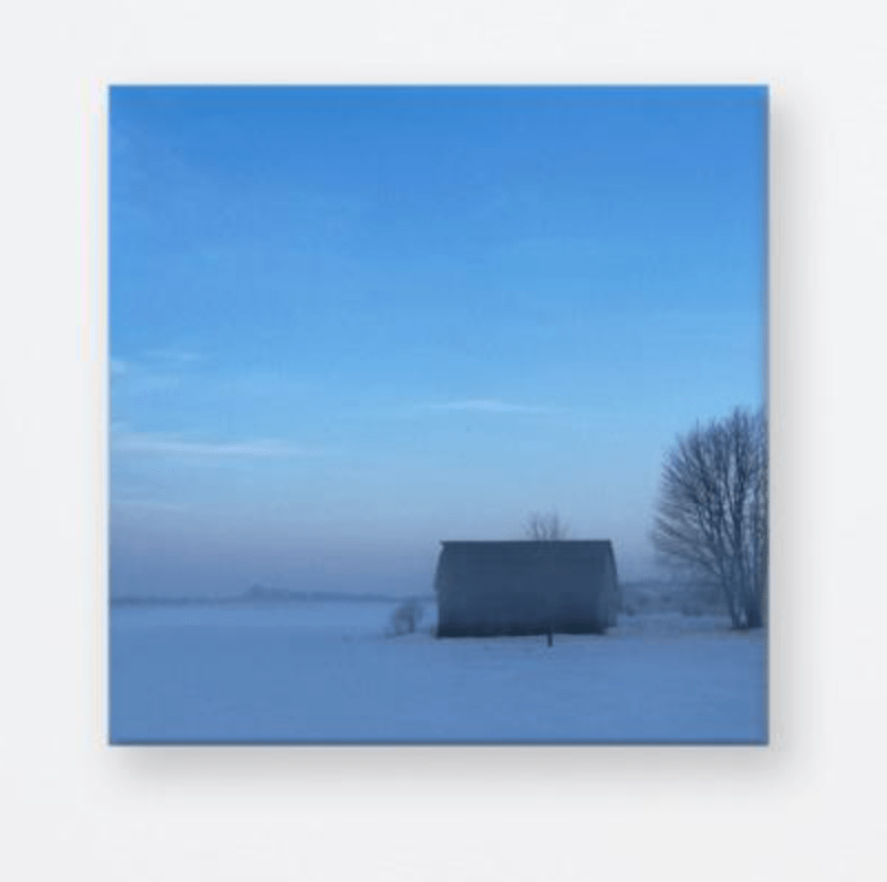 Old barn in snow field - the wheaten store